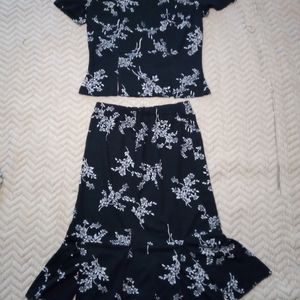 Two piece top and pencil skirt with ruffle bottom